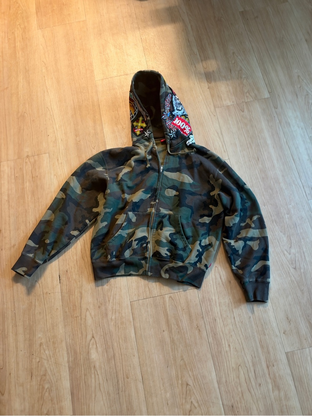 Supreme Camo Zip-Up Hoodie with Graphic Hood